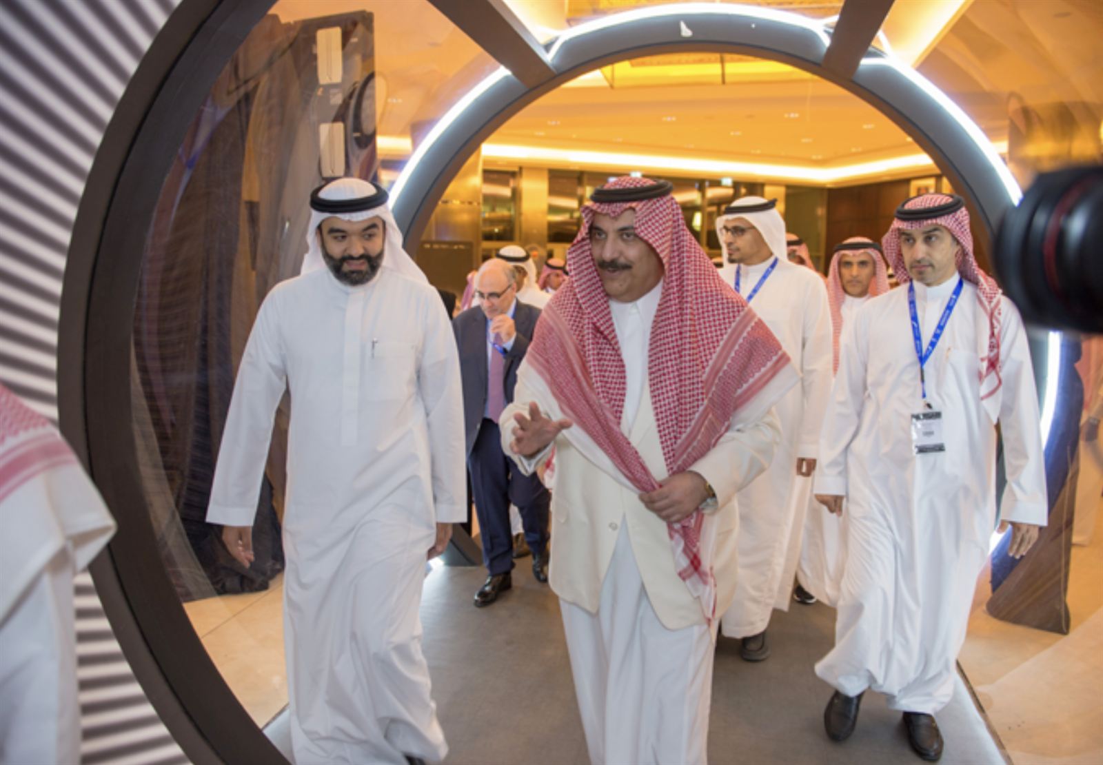 MCIT ministers walking through branded event entrance